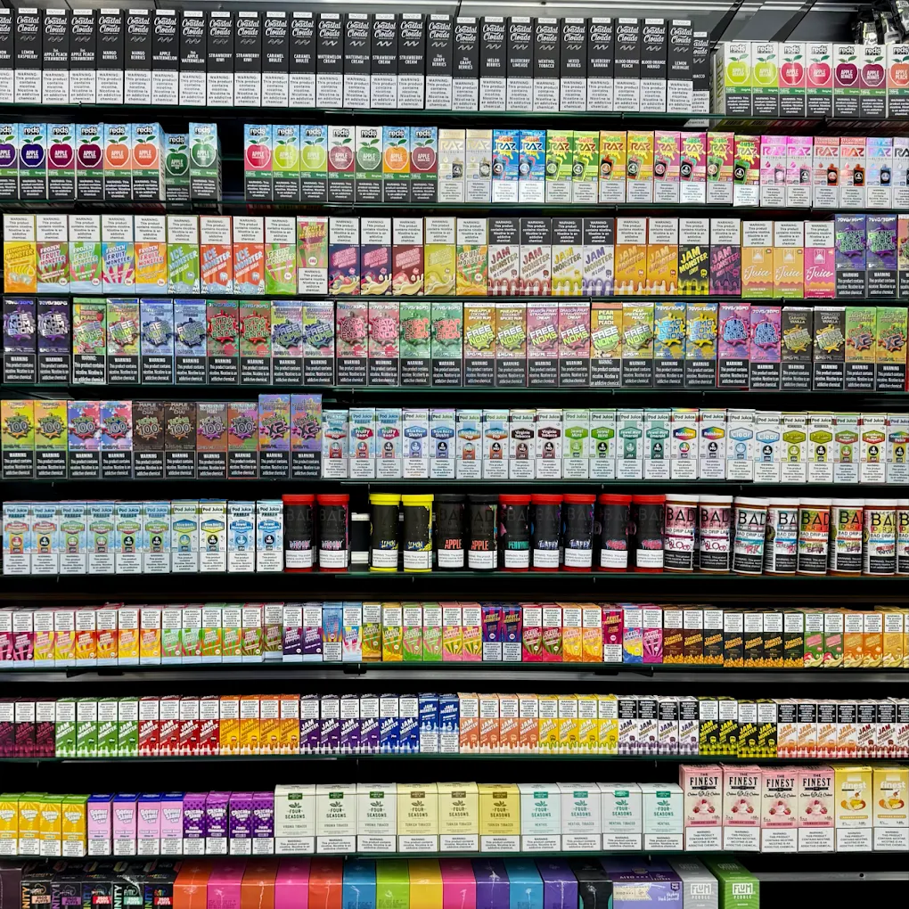 Massive e-liquid and vape juice wall at EZ Smoke House Hampton VA — every brand and flavor